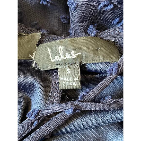 Effortlessly Easy Navy Blue Swiss Dot High-Low Midi Wrap Dress - Picture 12 of 12